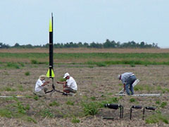 rocket being prepped at the pad