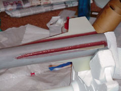 epoxy fillets applied to rocket, masking tape removed